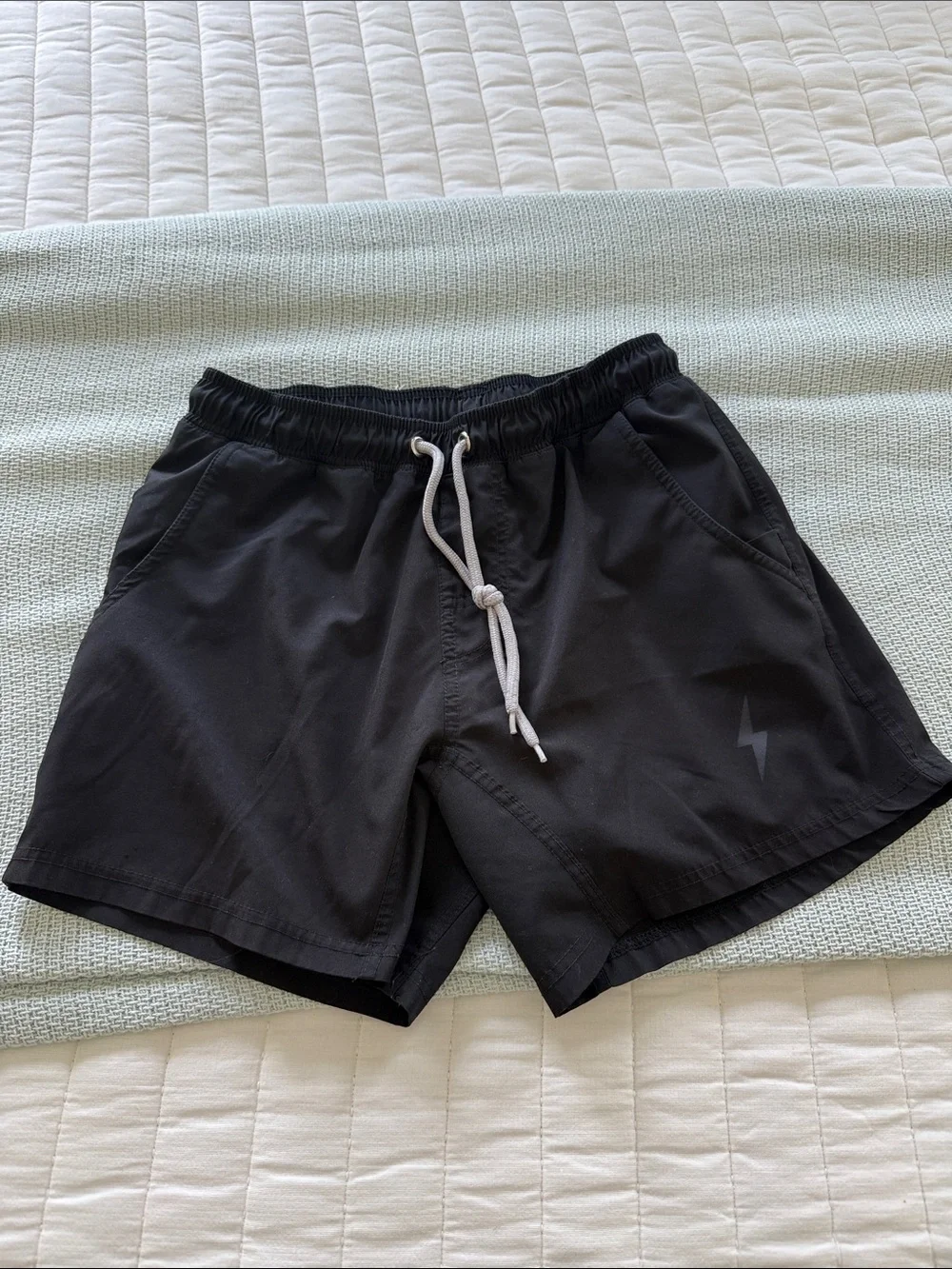Youth Bruce Bolt black athletic shorts with built in liner